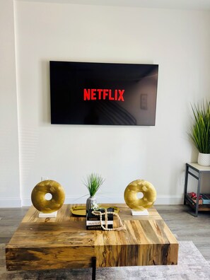 Living room lounge area with Samsung smart tv