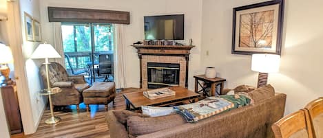 Living area with access to screened in back deck