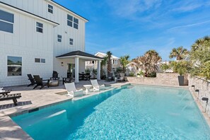 Your private pool awaits with ample seating for fun in the sun. (1)