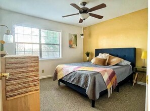 Second Bedroom with Queen Bed, Full Closet & View of Downtown Greenville