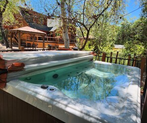 unique  hot tub located on a bridge
Overlooks a seasonal river 