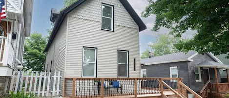 Front of the house, including the porch.