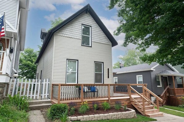 Front of the house, including the porch.