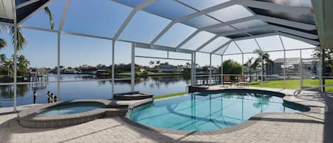 Private pool and hot tub overlooking the canal