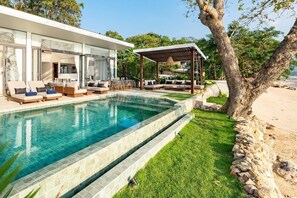 Relaxation redefined – feel the gentle sea breeze as you relax by our infinity pool, offering stunning views and peaceful moments.