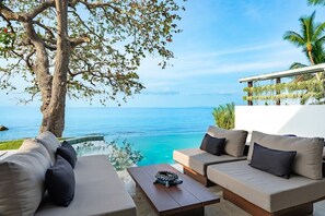 Chic comfort by the sea – lounge in style in our outdoor living area, where every moment is framed by the tranquil beauty of Koh Samui.