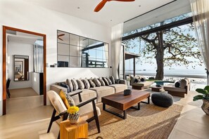 Where luxury lounging meets panoramic sea views – unwind in our living area that harmoniously connects you with the tranquil Koh Samui shores.