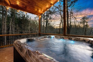 Surround yourself with the beauty of nature as you soak in our big hot tub oasis