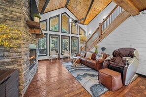 Step inside and discover a cozy space of our living room that seamlessly blends modern comforts with the timeless appeal of cabin living