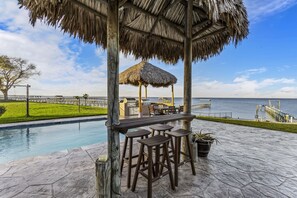 Sit and enjoy good times by the pool