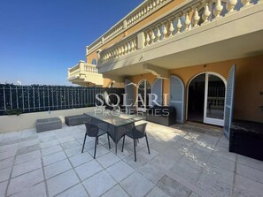 Terrace with dining table