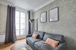 Salon avec canapé lit 