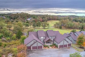The views of the golf course and Ozark Mountains are incredible from the home. 