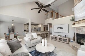 Open concept main floor - expansive living, kitchen and dining areas.