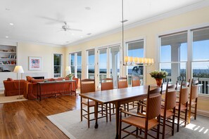 View of golf course and beach from the living and dining room on the top floor
