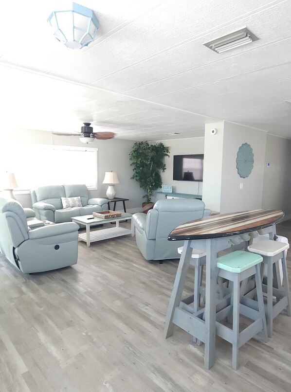 Living Room and Surfboard Dining Area