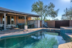 Spacious backyard includes a heated pool and hot tub (additional fee for pool and hot tub heating)
