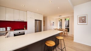 Kitchen and dining with Island bench seating