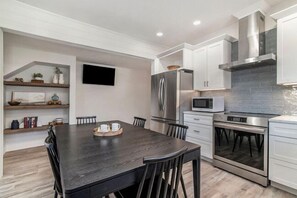 Dining table seats 6.  TV in the kitchen as well as the living area