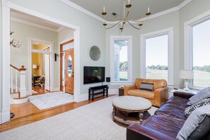 Cozy up with loved ones in our spacious living room, complete with a large Smart TV for movie nights and entertainment