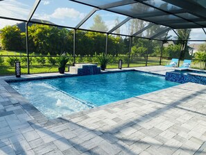 Large saltwater pool with sun shelf and bubblers