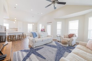 Dive into relaxation in your ocean-view living room. 🌊