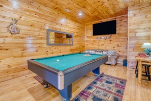 Pool table and TV.