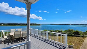 Large deck with fabulous views, dining table and gas grill