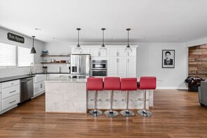 Discover our super clean and inviting kitchen, the heart of our home where culinary adventures await!
