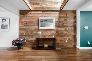 Be amazed with simple elegant wall with mirror and light decor  ChatGPT
