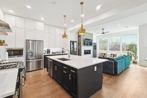 This kitchen is the epitome of the modern, luxury lifestyle! Bright and charming, this fully equipped kitchen has everything you need to unleash your inner chef.