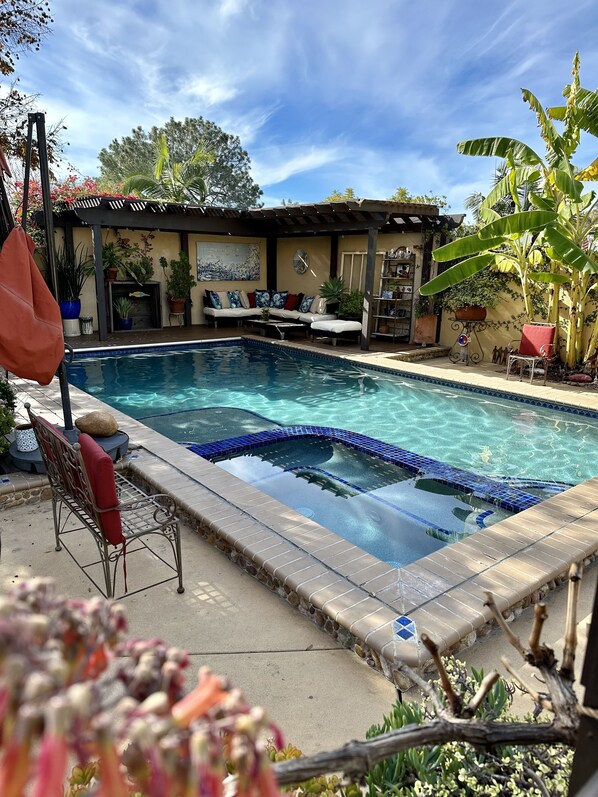 Solar heated saltwater pool and jacuzzi for registered guests use