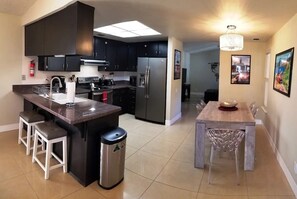 Fully stocked kitchen and dining area for nice home-cooked meals