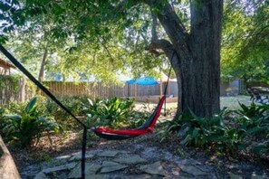 Fully Fenced Backyard with hammock