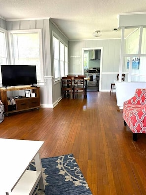 Facing the dining and kitchen from the living room