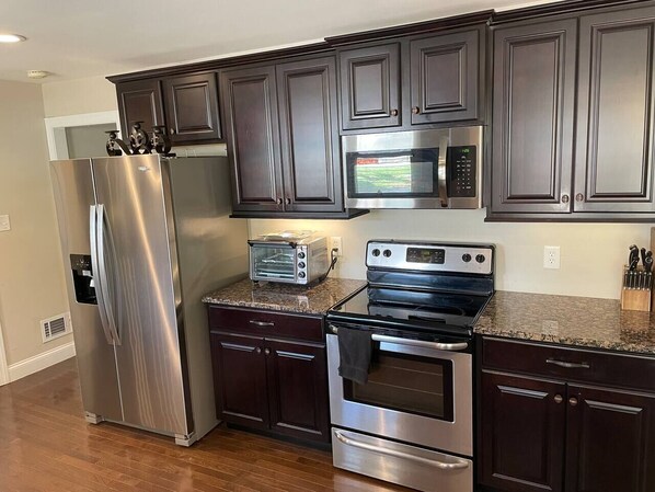 A beautiful modern kitchen with all the touches of home. We have cooking essentials and utensils and gadgets galore.  