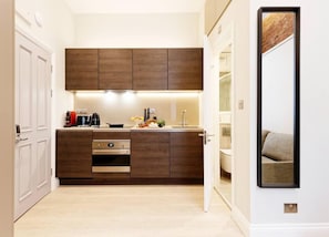 Fully equipped kitchen, coffee maker, kettle, toaster, oven-microwave, washingmachine-dryer.