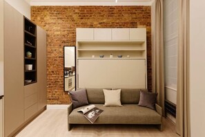 The wall bed can be easily folded into a comfortable sofa for your commodity.