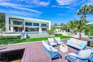 The overwater deck on the tranquil Mayan Lake with its lavish tropical foliage.