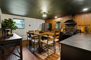 Fully stocked kitchen with standard refrigerator, microwave, gas stove, etc.
