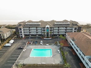 Front View of Condo Building and Pool