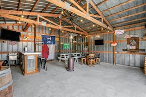 Separate game room with bar games. The ultimate setup for a fun guest game night