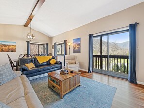 Lots of natural light in the open concept living room/dining space.