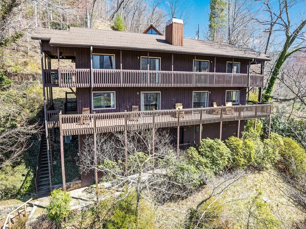 Perched above the Maggie Valley Club and Golf course.