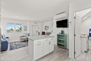 Dining/living area. Full bathroom on the right.