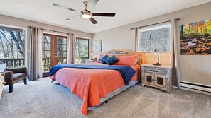 The upper-level king bedroom w/ensuite full bathroom and balcony
