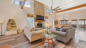 The spacious open-concept on main level of the cabin is perfect for entertaining