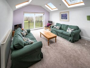 Living room | Long Byres- Heather Cottage - Long Byres, Talkin Head, near Carlisle