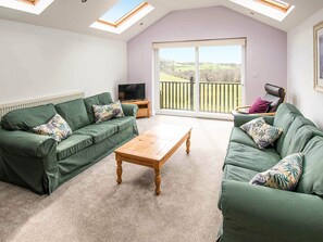 Living room | Long Byres- Heather Cottage - Long Byres, Talkin Head, near Carlisle