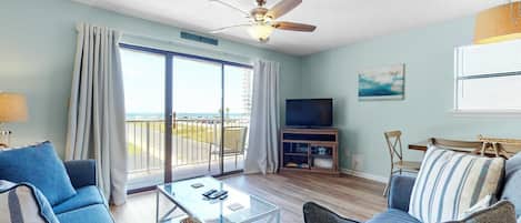 Relax in our cozy living room and enjoy your favorite TV show or movie on the smart TV, offering both cable and streaming options.